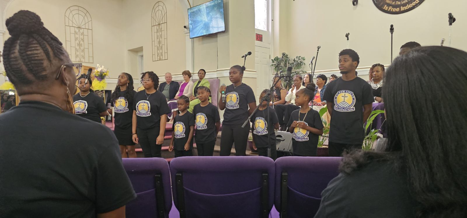Choir group in matching custom shirts
